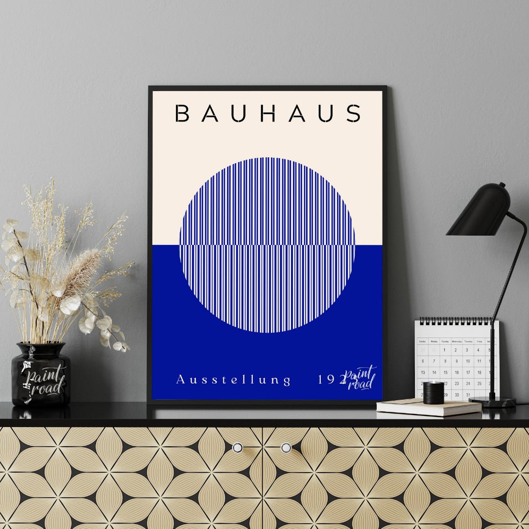 This Bauhaus-inspired poster features a large, off-white circle filled with thin, vertical blue str… for office