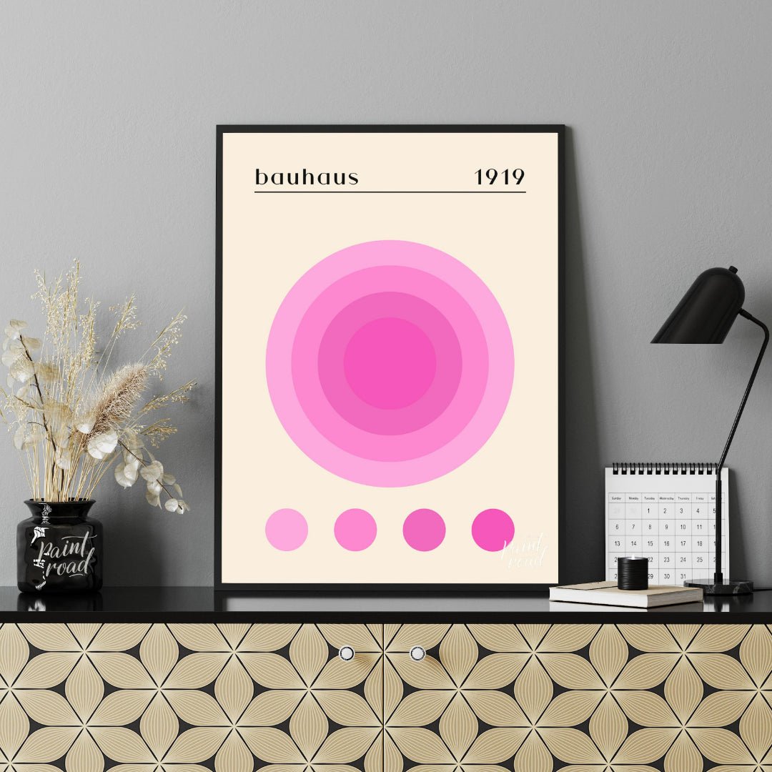 This Bauhaus-inspired print, "Bauhaus Pink Gradation Circle," showcases a central circular motif co… for office
