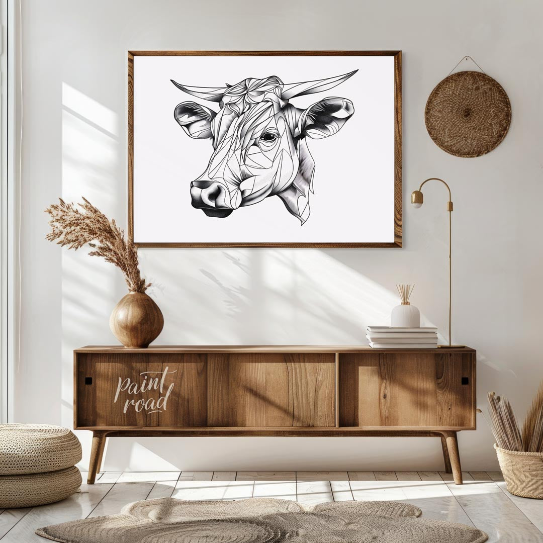 This striking black and white illustration features the head of a cow rendered in a unique geometri… for living room