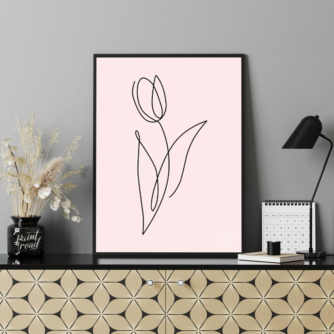 This elegant and minimalist artwork features a single tulip, rendered in a continuous, flowing blac… for lovely house