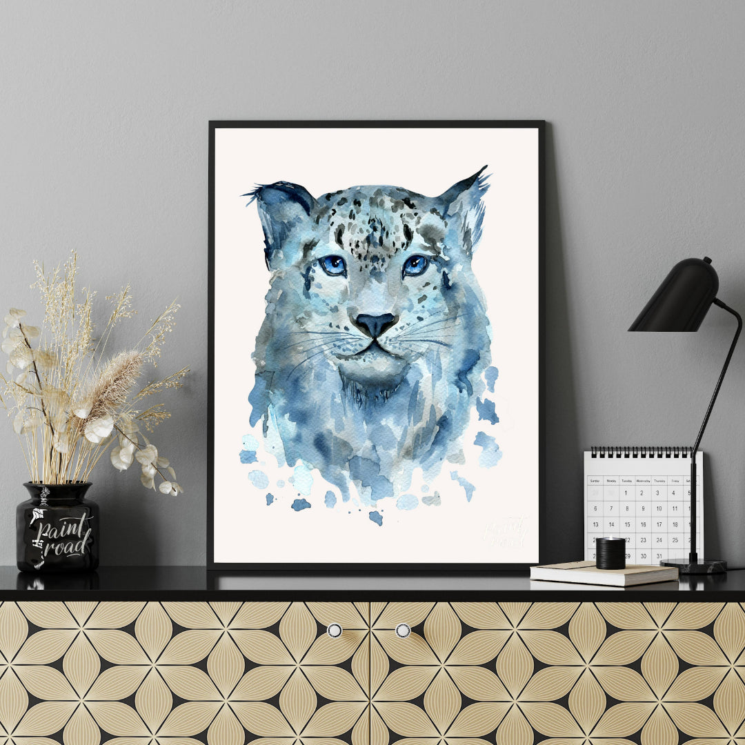 This watercolor painting captures the serene beauty of a snow leopard's face. The artist uses soft,… for office