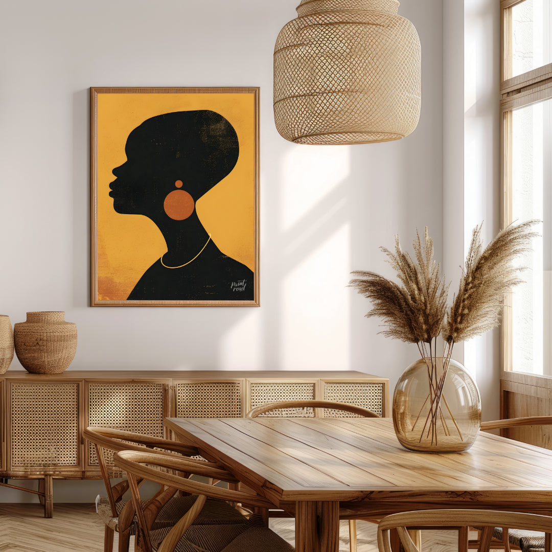 A minimalist and striking portrait of a woman, rendered in bold black and gold tones. The artwork f… for dining room