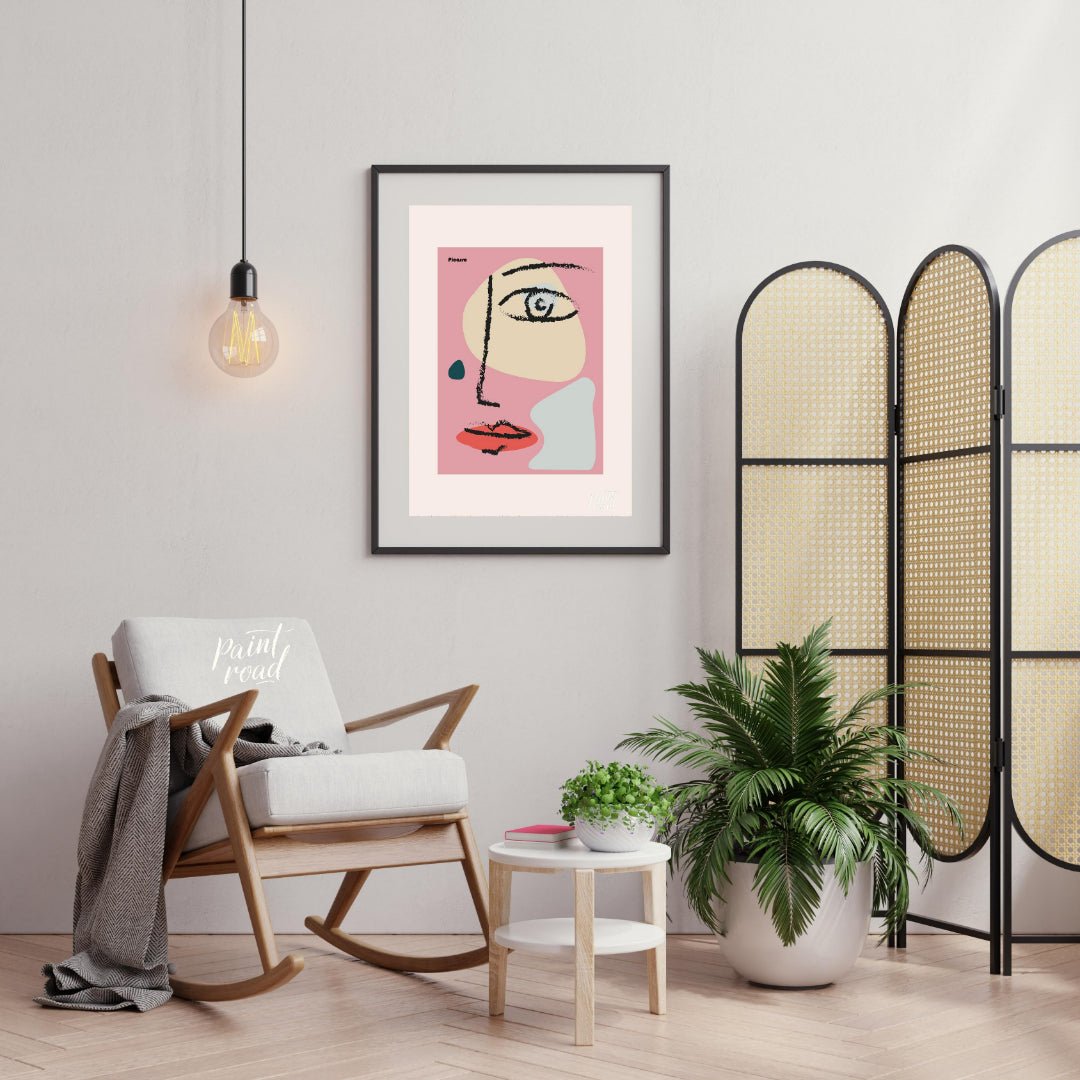 This vibrant art print features an abstract, minimalist face design inspired by the cubist style of… for living room