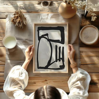 This artwork features a bold, abstract form rendered in thick black lines against a textured light … for other