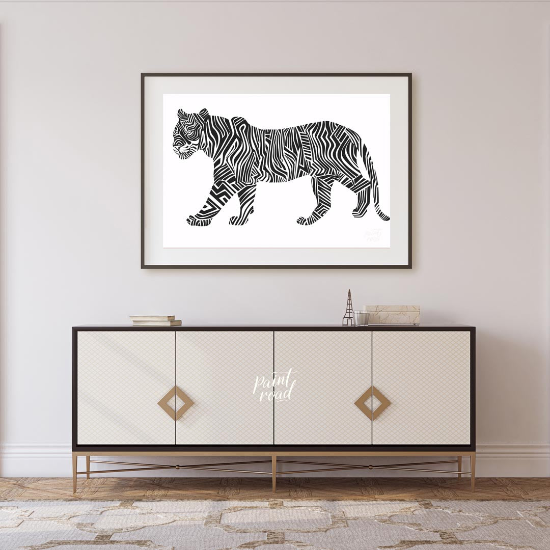 This bold and graphic artwork depicts a tiger in profile, but with its traditional stripes reimagin… for living room