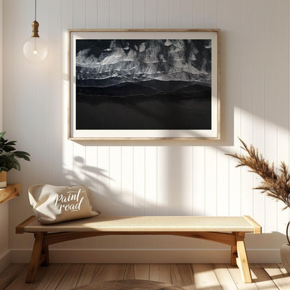 This stunning aerial photograph captures the dramatic beauty of a black sand beach, likely in Icela… for entryway