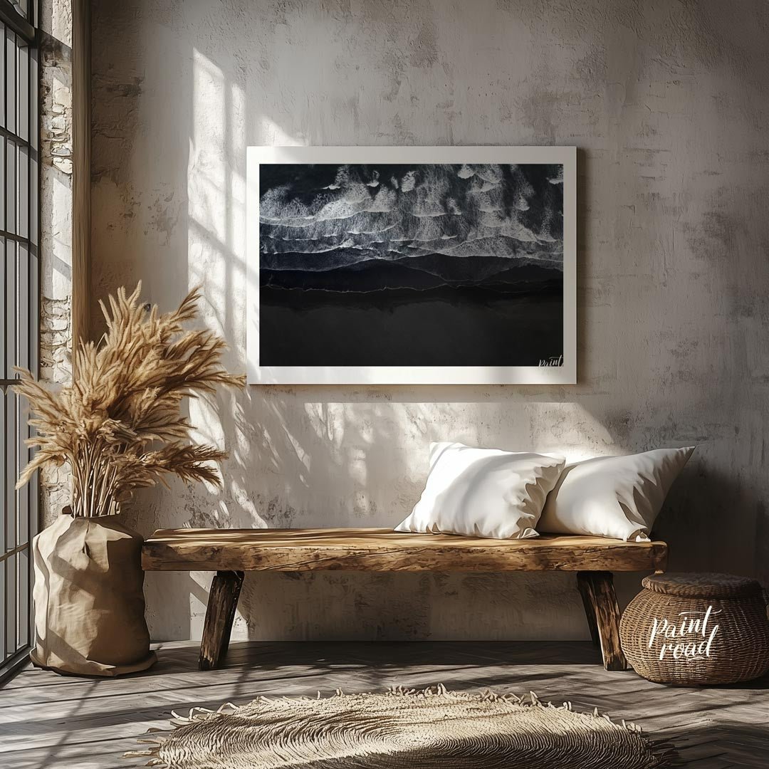 This stunning aerial photograph captures the dramatic beauty of a black sand beach, likely in Icela… for entryway