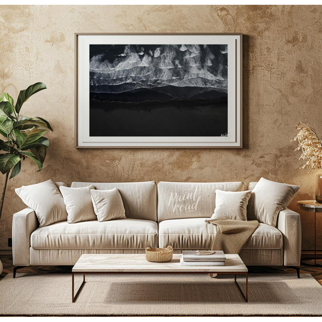 This stunning aerial photograph captures the dramatic beauty of a black sand beach, likely in Icela… for living room