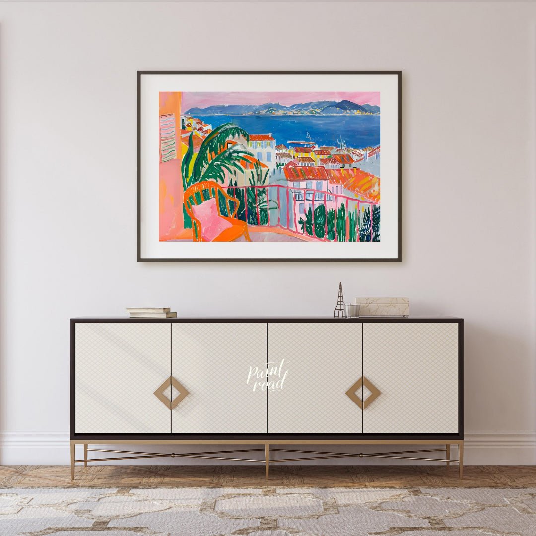 This vibrant painting captures a stunning coastal scene from a charming balcony. The artist employs… for living room