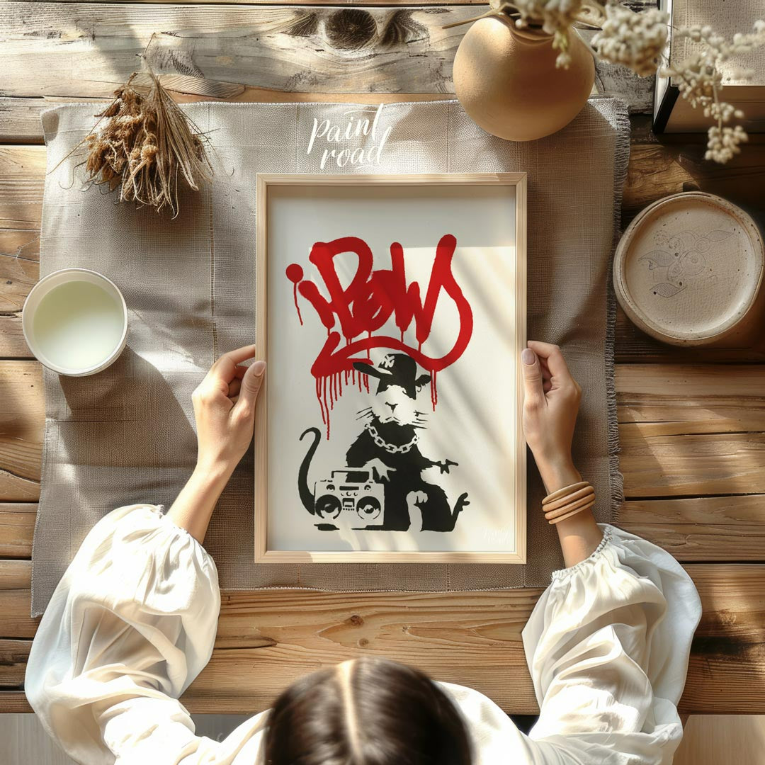 This iconic art print features Banksy’s “Gangsta Rat” stencil, depicting a cool and rebellious rat … for dining room