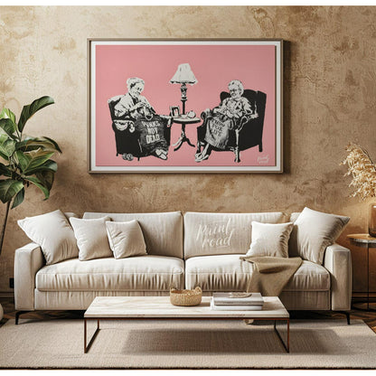 This iconic Banksy print, titled “Grannies,” features two elderly women seated in armchairs, dilige… for living room
