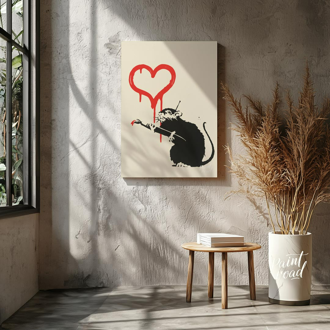 This striking art print features Banksy’s “Love Rat” stencil, depicting a black rat holding a paint… for living room