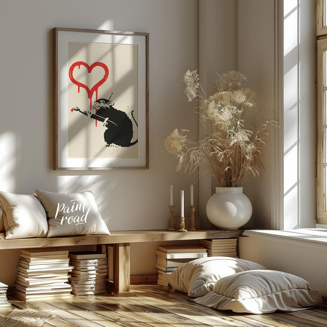 This striking art print features Banksy’s “Love Rat” stencil, depicting a black rat holding a paint… for living room