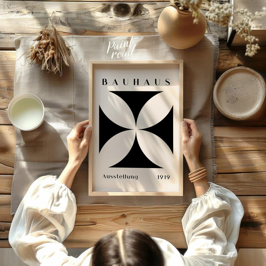 A quintessential example of Bauhaus design, this poster features a bold, graphic black quatrefoil s… for other