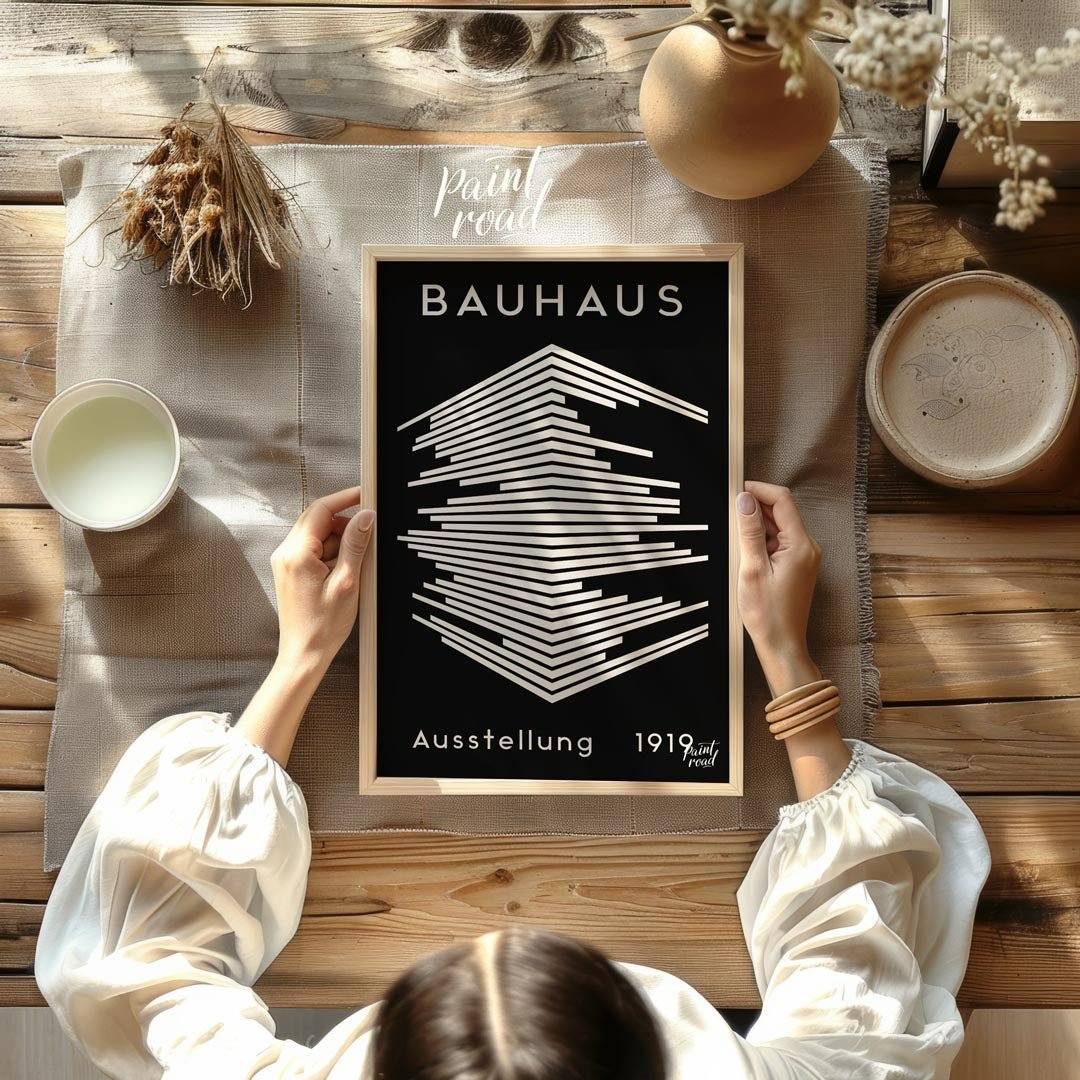 This striking image is a reproduction of a classic Bauhaus exhibition poster from 1919. Dominated b… for other