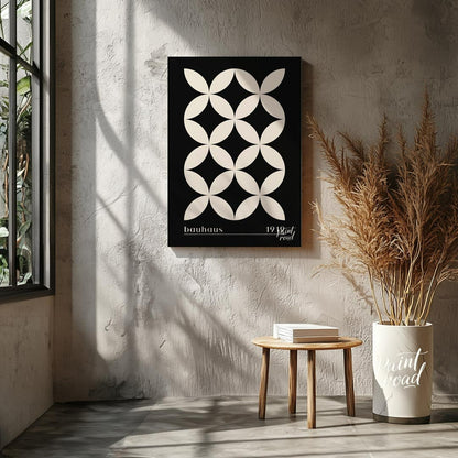 This high-contrast Bauhaus poster presents a captivating pattern of white petal-like shapes forming… for living room