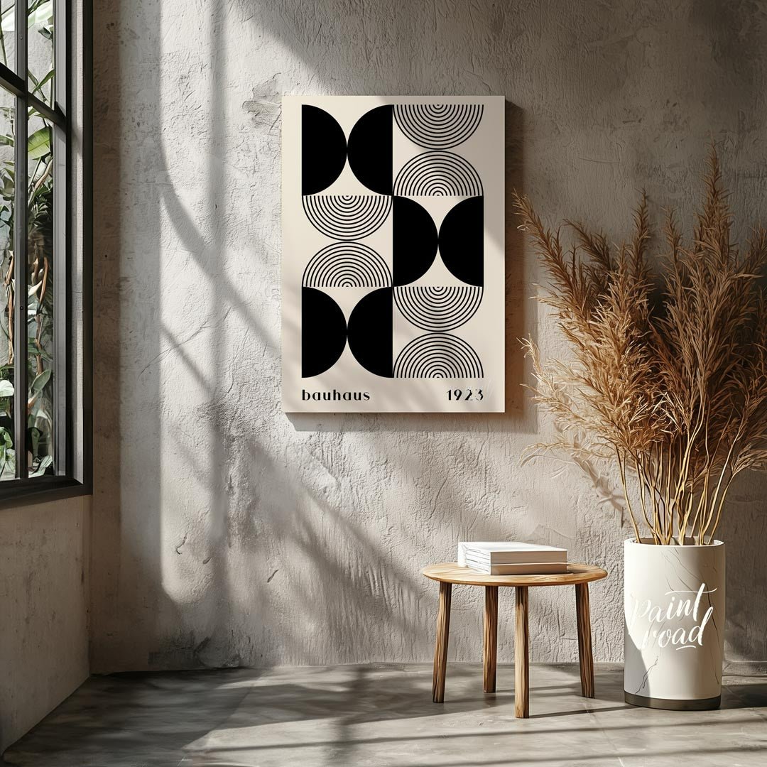 This striking art print is a homage to the iconic Bauhaus movement, featuring a sophisticated black… for living room