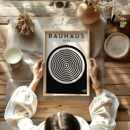 This image showcases a classic Bauhaus exhibition poster from 1923, embodying the core aesthetic of… for other