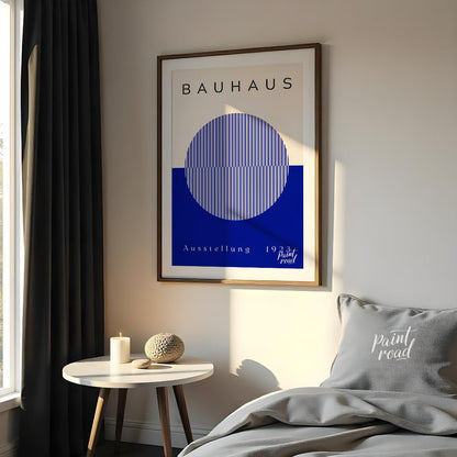 This Bauhaus-inspired poster features a large, off-white circle filled with thin, vertical blue str… for bedroom