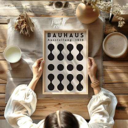 This poster, titled "BAUHAUS Ausstellung 1919," is a prime example of the iconic Bauhaus design phi… for other