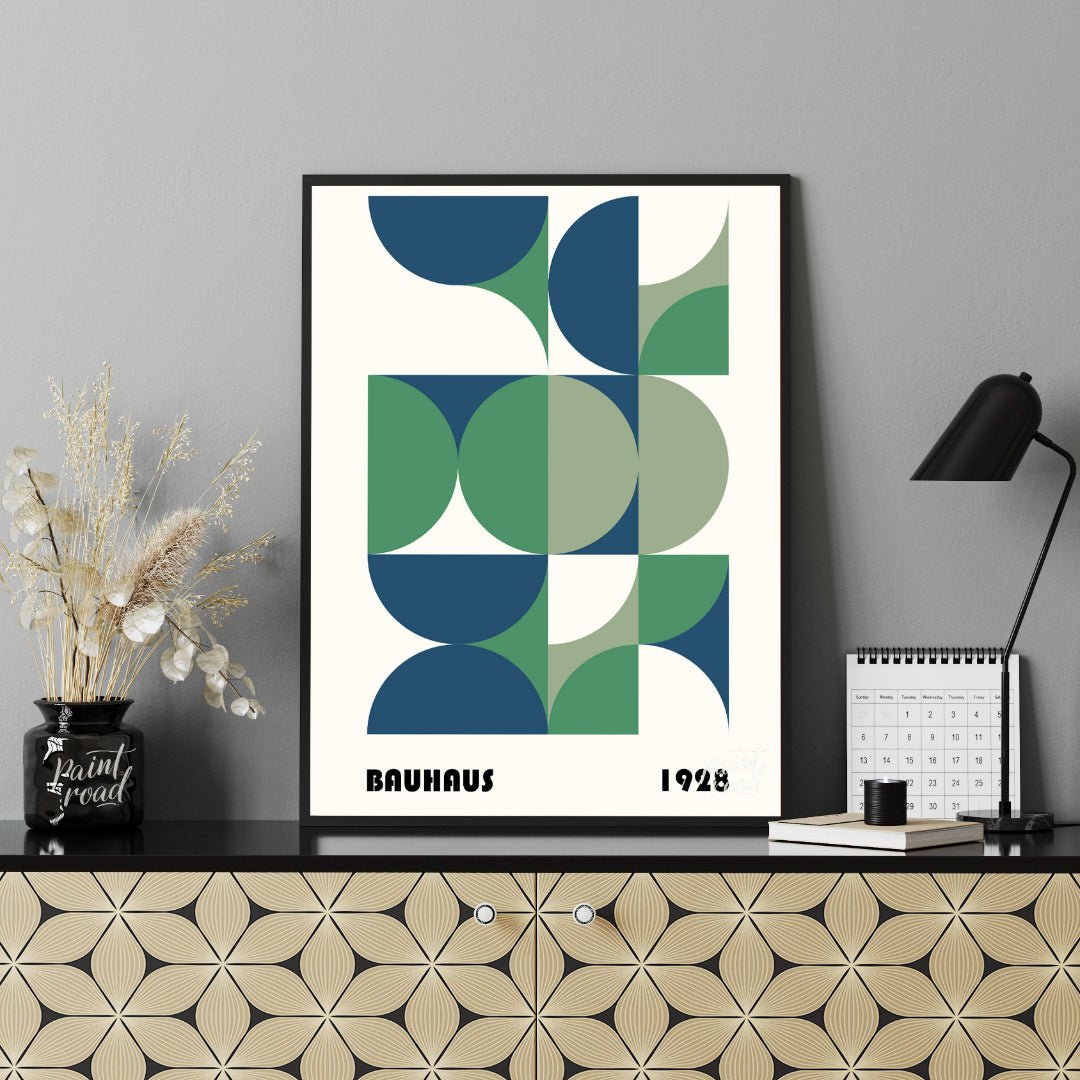 This Bauhaus-style poster is a vibrant composition of interconnected geometric shapes, primarily qu… for office