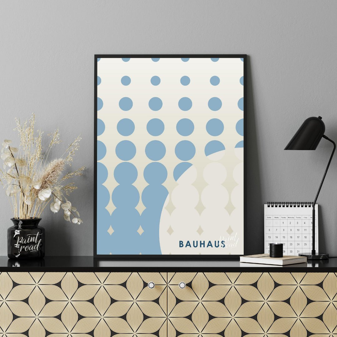 This striking Bauhaus-inspired poster features an array of blue dots arranged in a grid, transition… for office
