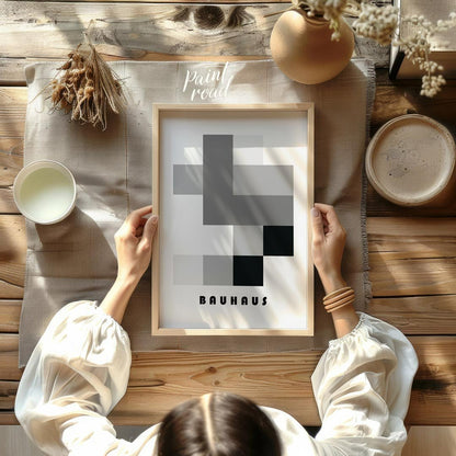 This striking Bauhaus-inspired poster showcases a composition of interlocking rectangles and square… for other