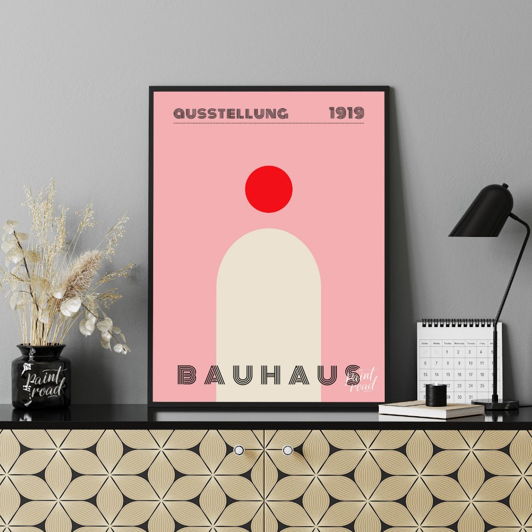 This minimalist Bauhaus poster features a bold red circle positioned above a large, light beige arc… for office
