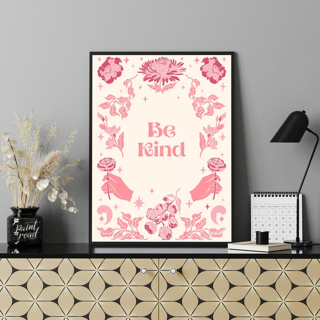 This beautiful and inspiring art print features the uplifting message “Be Kind” prominently display… for office