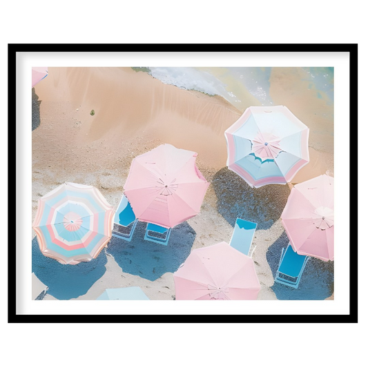 This aerial photograph captures a serene beach scene, showcasing a collection of pastel-colored par… for home