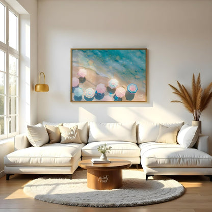 This aerial photograph captures a serene beach scene, showcasing a collection of pastel-colored par… for living room