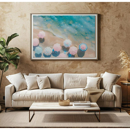 This aerial photograph captures a serene beach scene, showcasing a collection of pastel-colored par… for living room