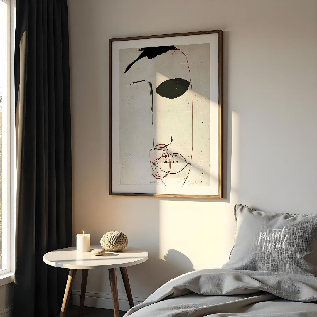This artwork features a minimalist portrait of a face rendered in bold black strokes against a text… for bedroom
