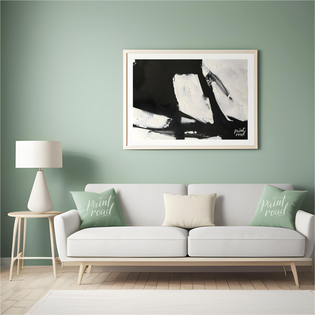 This abstract painting features a dynamic interplay of stark black and white shapes, creating a sen… for living room