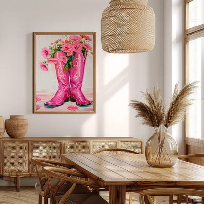 Brighten up your space with this vibrant artwork featuring a pair of bold, pink cowboy boots for Extra Kitchen