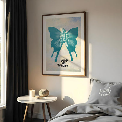 This striking art print features a bold, monochromatic blue-green silhouette of a figure with large… for bedroom