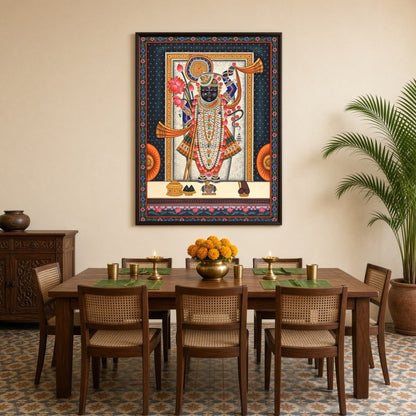 Embrace the divine presence of Shrinathji adorned with lotus and conch in this exquisite Pichwai for Dining