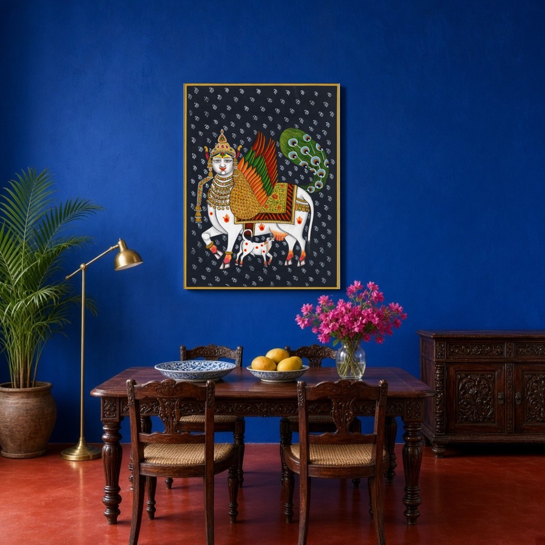 This captivating Pichwai artwork features the divine Kamdhenu adorned with vibrant wings and an for Dining