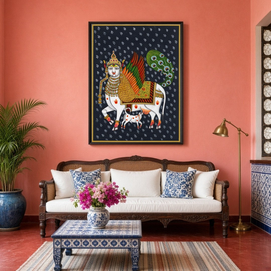 This captivating Pichwai artwork features the divine Kamdhenu adorned with vibrant wings and an for Living Room