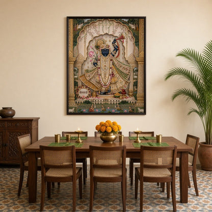 This exquisite Pichwai artwork features Lord Krishna adorned with intricate jewelry, playing the for Dining