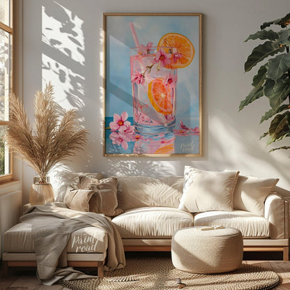 This refreshing painting captures a vibrant citrus spritzer, adorned with pink blossoms. The artist… for living room