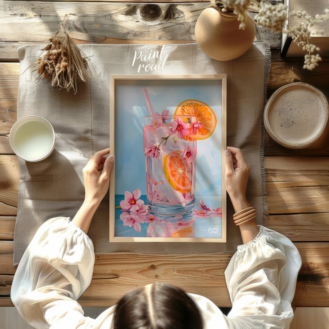 This refreshing painting captures a vibrant citrus spritzer, adorned with pink blossoms. The artist… for other