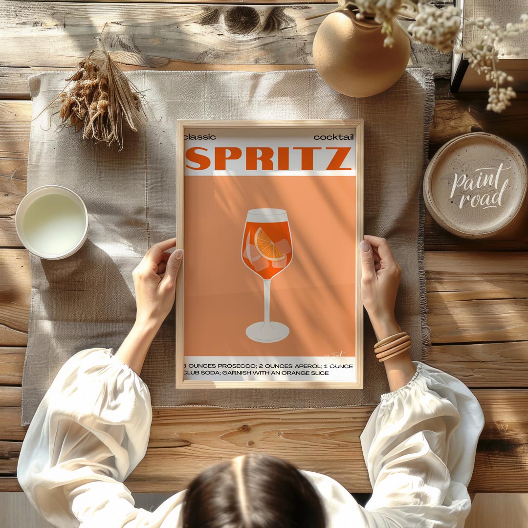 This crisp and inviting poster celebrates the timeless "classic cocktail" Spritz, depicted with a w… for other