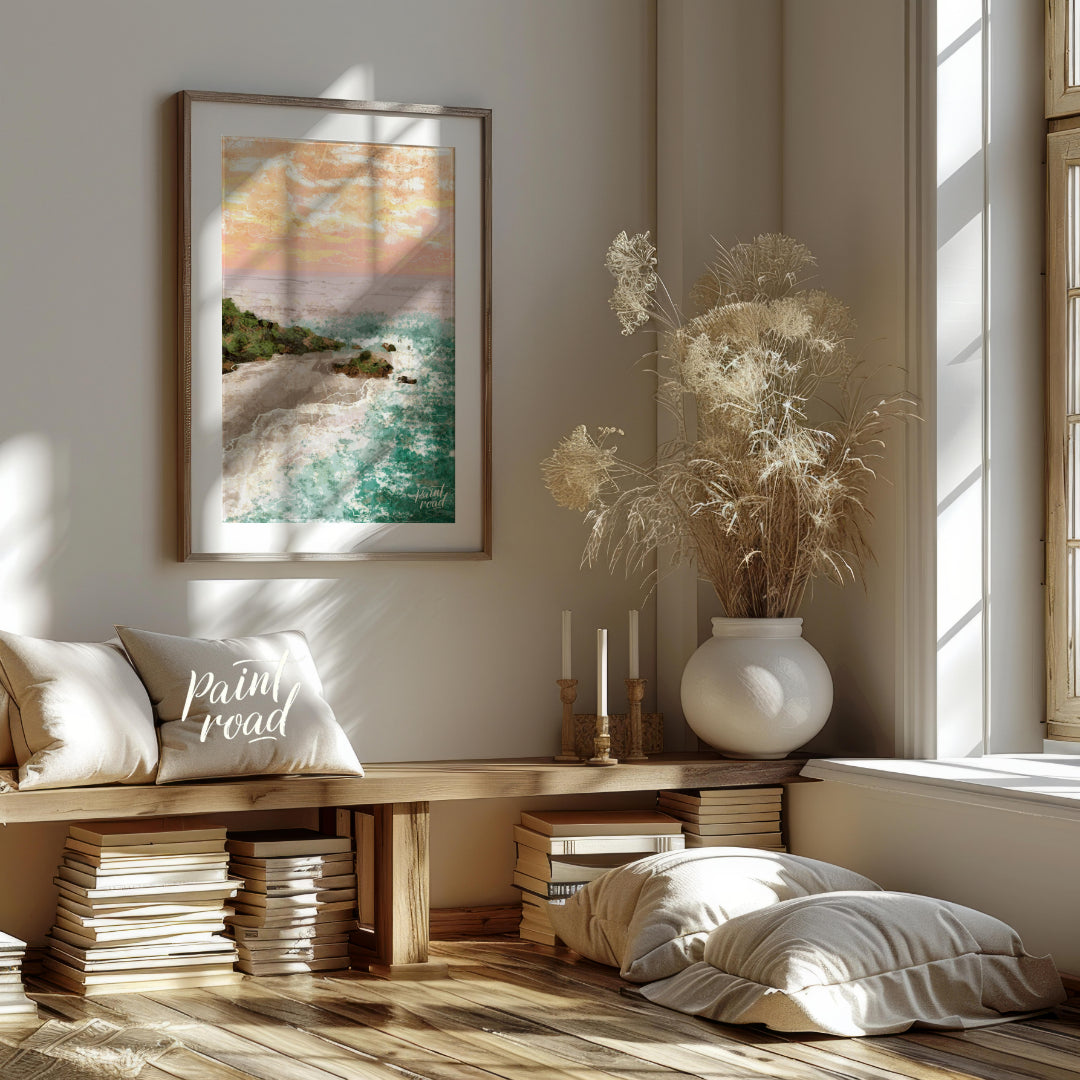 This artwork captures a serene coastal landscape at sunset. The sky is awash with soft hues of oran… for living room