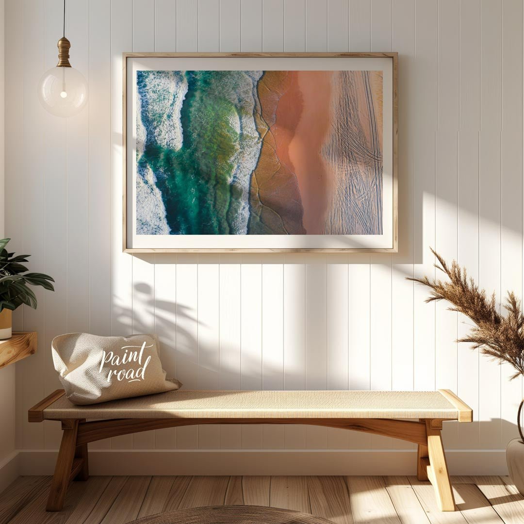 “Coastal Vista” offers a breathtaking aerial perspective of a vibrant beach scene, showcasing the s… for entryway
