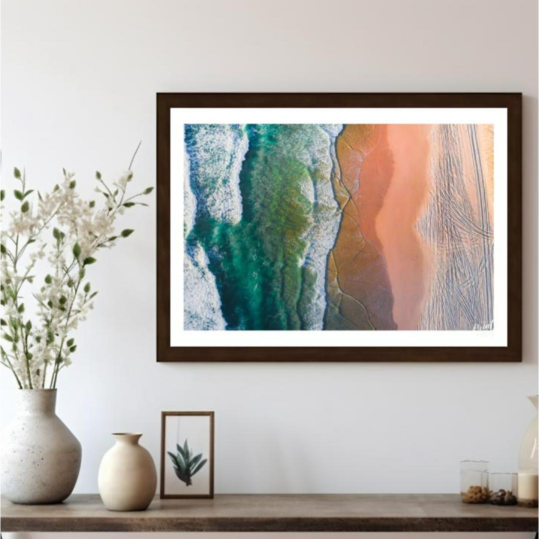 “Coastal Vista” offers a breathtaking aerial perspective of a vibrant beach scene, showcasing the s… for living room