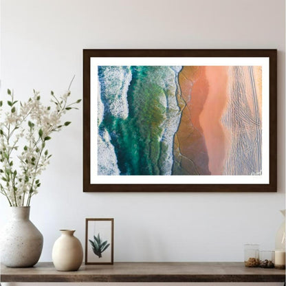 “Coastal Vista” offers a breathtaking aerial perspective of a vibrant beach scene, showcasing the s… for living room