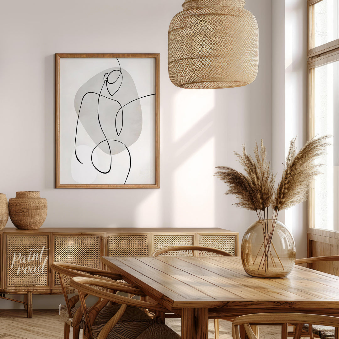 This minimalist artwork features a single, continuous line forming a stylized figure against a back… for dining room