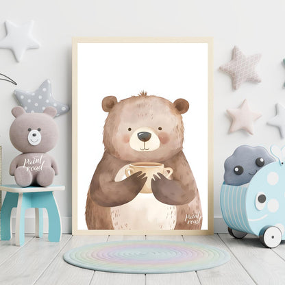 This heartwarming watercolor illustration portrays a plump, friendly bear holding a warm mug with b… for nursery