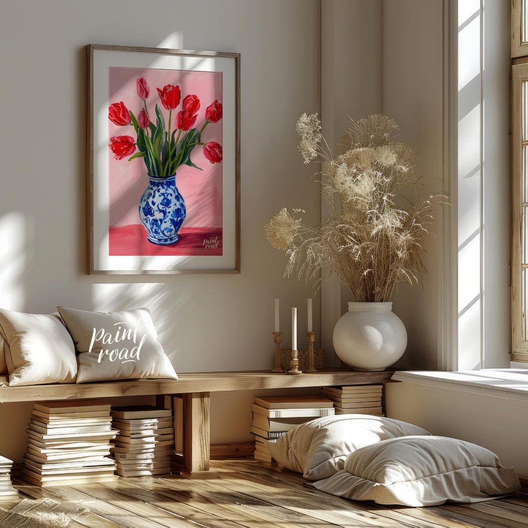 This artwork features a vibrant bouquet of red tulips arranged in a classic blue and white patterne… for living room
